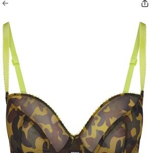 SKIMS Green and Brown Camouflage Bra with matching G-string picot stitching.